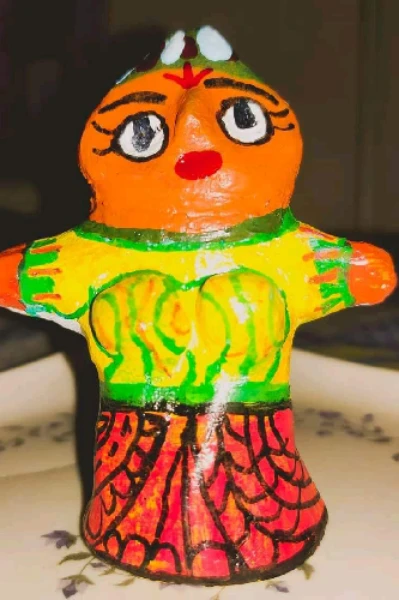 পুতুল  নেবে গো।
